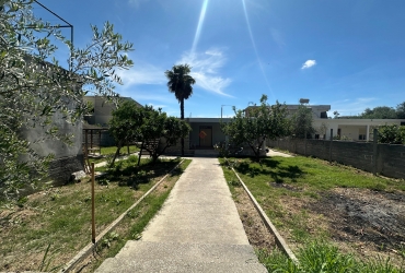  Opportunity in Vlora: Private House with Land and Shop Space at the City Entrance